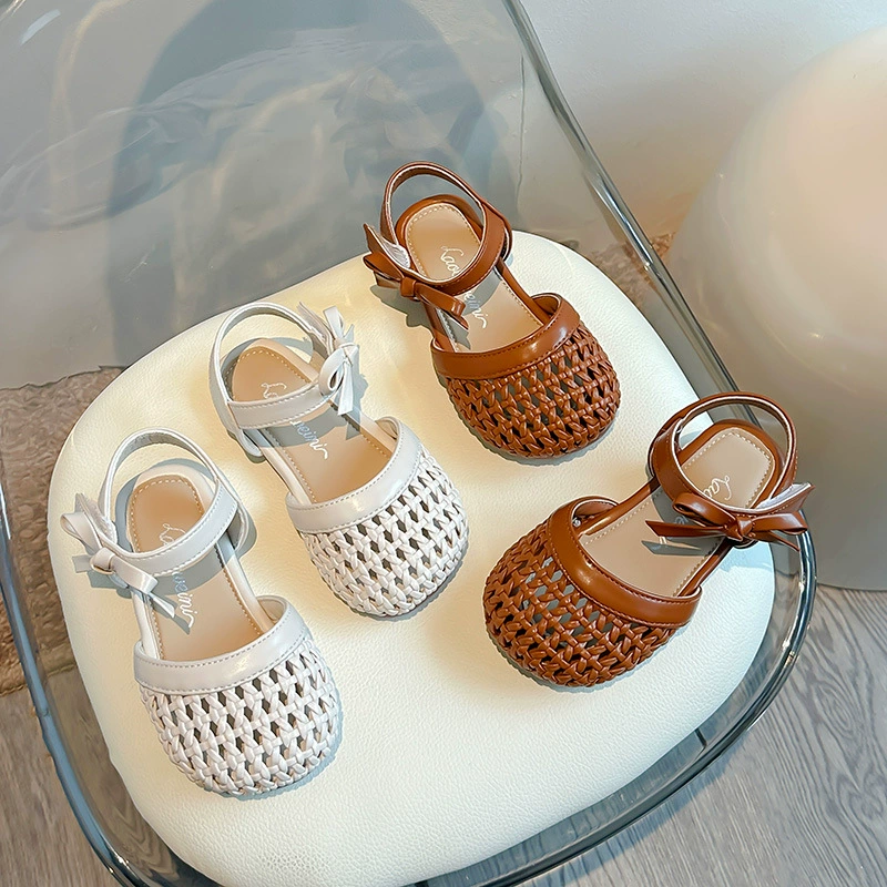 Баотоу тканые сандалии для девочек 2025 лето новый детский мода ажурная принцесса сандалии на мягкой подошве пляжные сандалии
