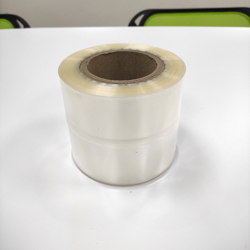 Película de etiqueta transparente al por mayor de fábrica conjunto de película retráctil reticulada etiqueta impresión en color etiqueta caliente Película botella boca película protectora transparente