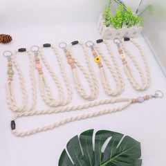 手編みの菊の花は斜めに携帯の縄の文芸の趣味にまたがります。
