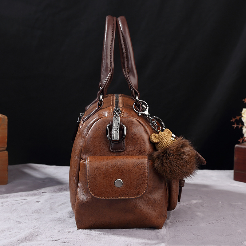 2023 Xiti Paul New Style Crossbody Große Kapazität Handheld Kontrast Kissen Boston Damentasche_voghion.com