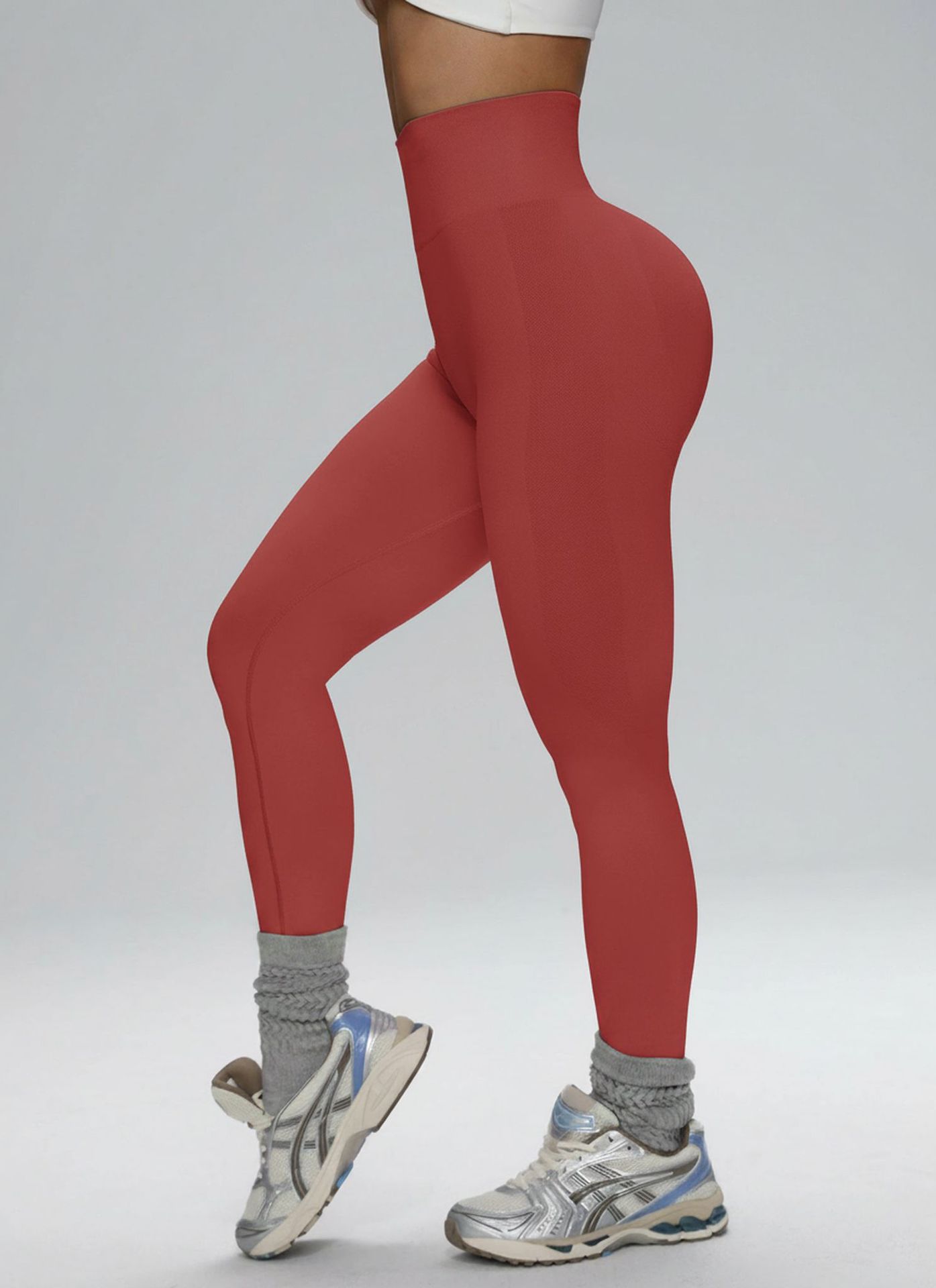 Europa y los Estados Unidos sin costuras cintura alta pantalon de gimnasio de alta cadera para mujeres corriendo al aire libre apertado nueve pantalones de pelusa de miel
