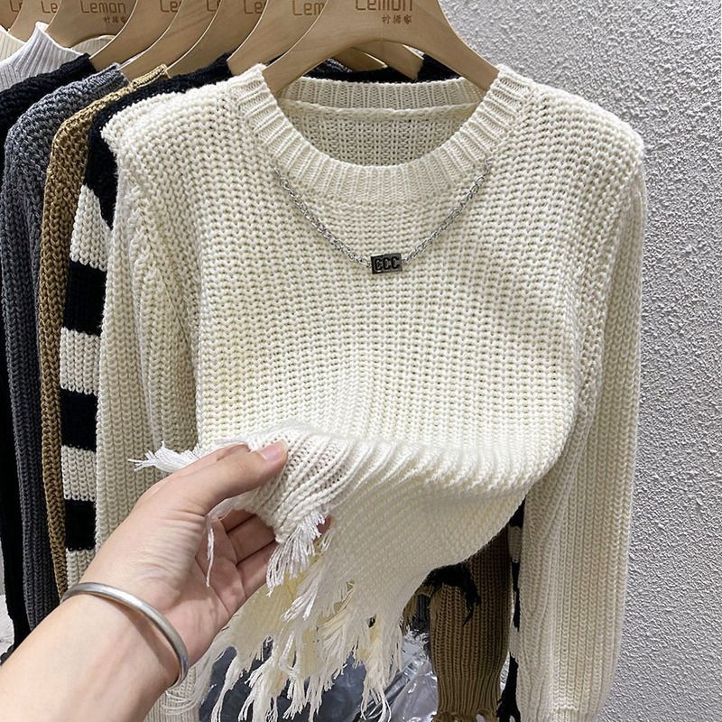 Spring short knitted retro sweater with a round collar