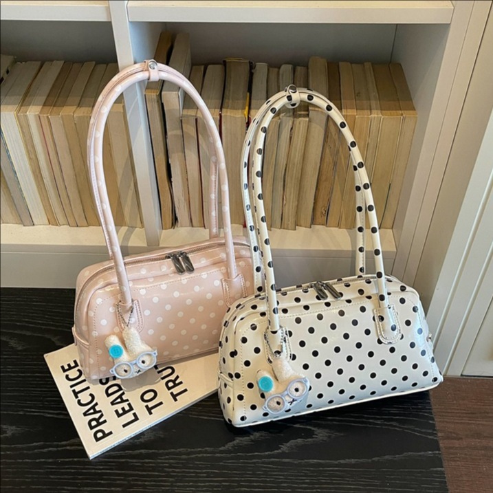 La versión coreana de Xiaozhong Wa punto de bolso de almohada de mano casual 2026 nueva moda versátil bolso de hombro bolso de brazo de alto valor