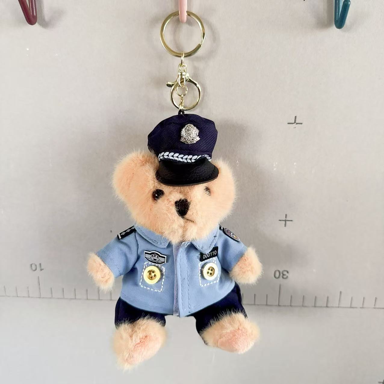 Colgante de oso de la policía de tráfico