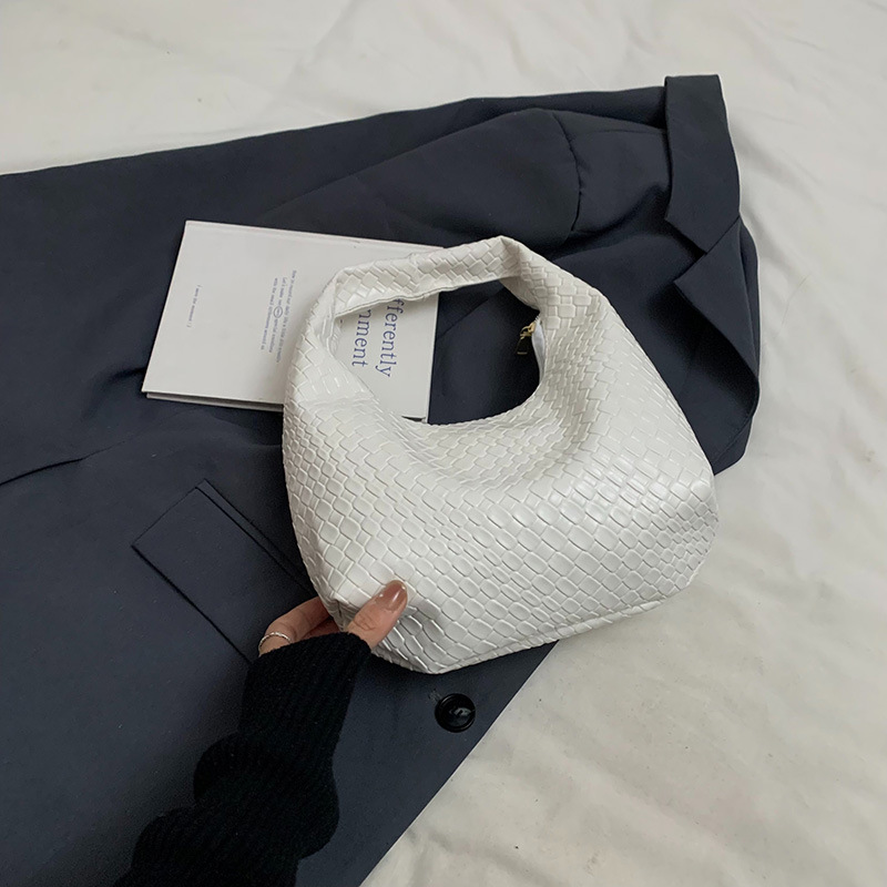 Red retró simple mujer 2024 otoño y invierno nueva moda ocio mochila bolsa trenzada bolso de hombro bajo la axila