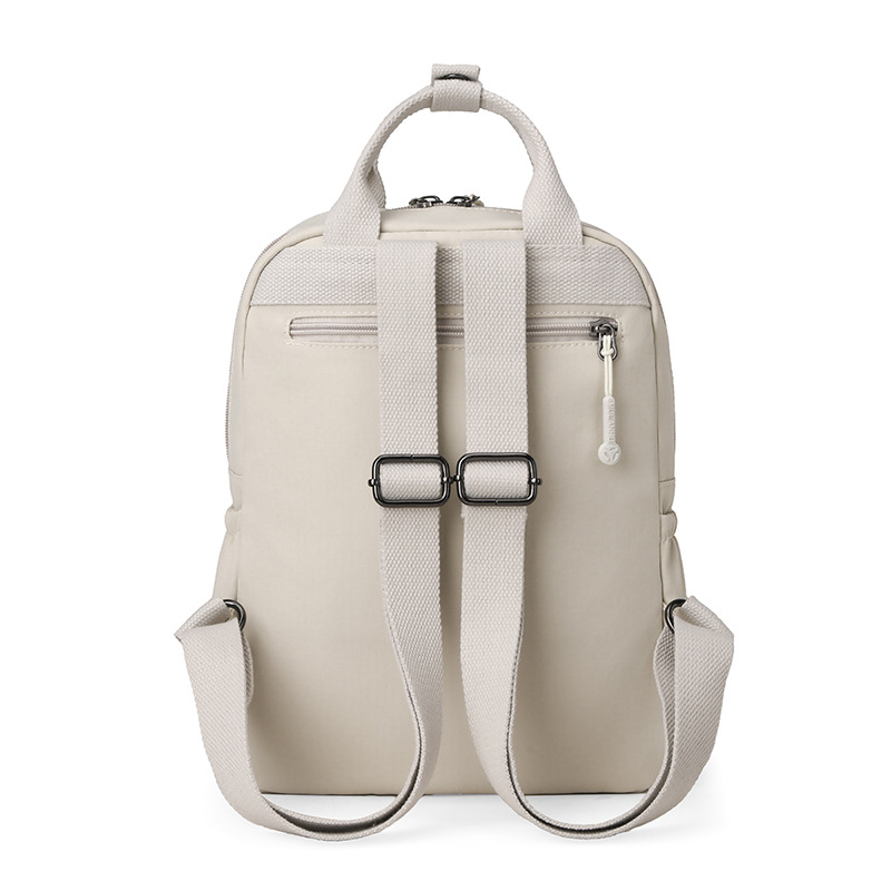 Mochila de tela de nailon de color sólido de moda transfronteriza, nueva moda, todo fósforo, mochila de viaje para mujer de gran capacidad