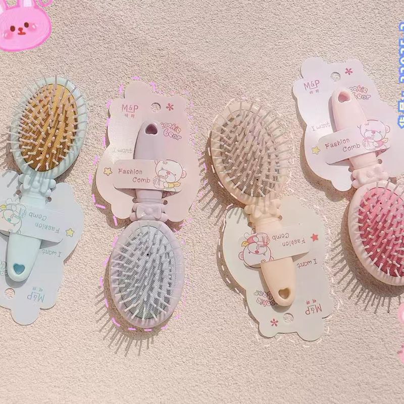 明牌のキャンディー色のエアクッションの美容櫛の少女のかわいい女の子の携帯の小さい櫛のエアバッグは櫛の卸売りをマッサージします。|undefined