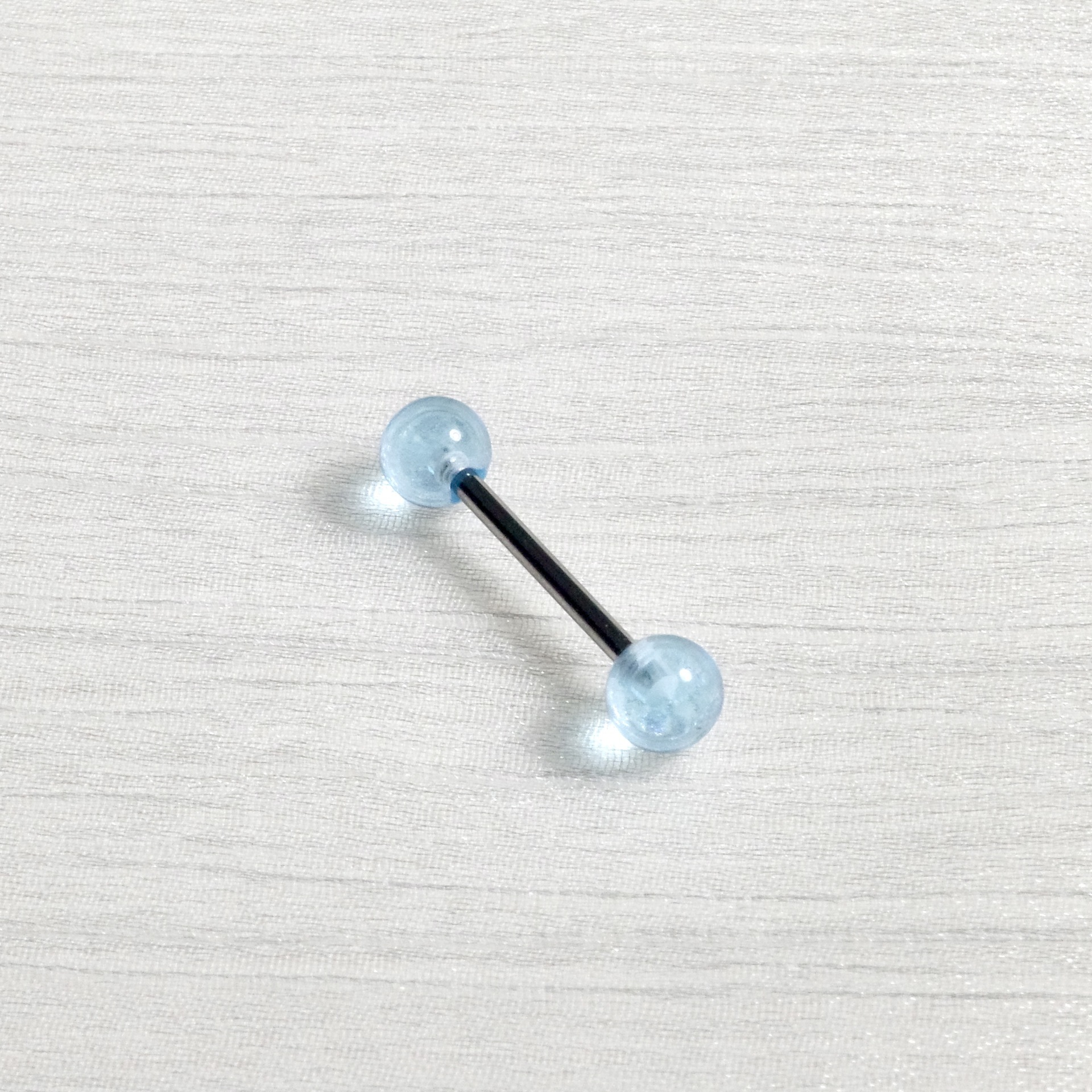 Pointed labret stud close-up product detail