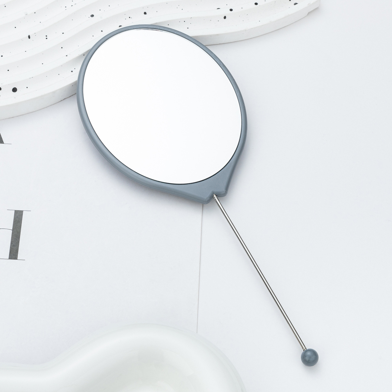 Espejo de mano al por mayor espejo de maquillaje HD multicolor bricolaje ovalado con mango espejo portátil portátil de una cara