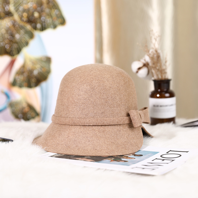 Sombrero de otoño e invierno pura lana estilo Coreano Japonés personalidad la moda brecha arco pequeño sombrero cúpula en stock al por mayor