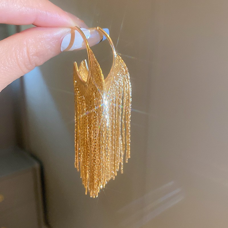 Pendientes de borla de hoja de circón largo de viento de metal con aguja de plata Pendientes de moda exquisita Pendientes de lujo ligero de viento frío