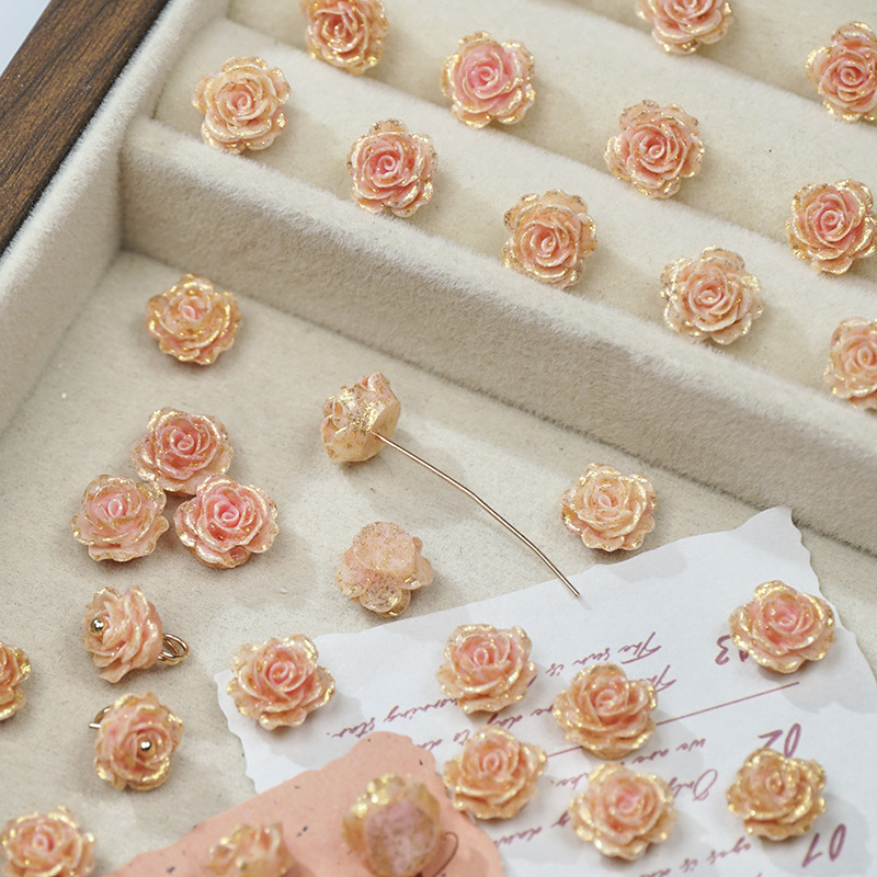 穴のない細いキラキラの柔らかいゴムの花の光はバラの花の片面の彫刻のdiyの手作りの数珠のネイルの携帯電話のケースの材料を変えます。