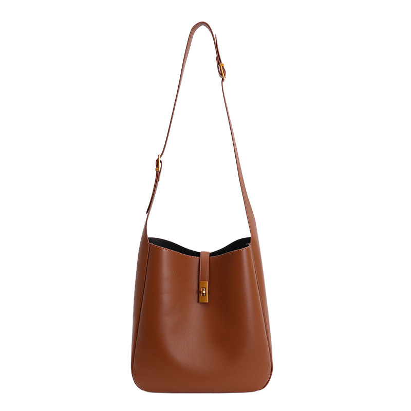 Transfronterizos de alto nivel sensación de cuero suave bolso de cubo de gran capacidad bolso de viaje para mujeres 2025 nuevo retro bolso de mochila para niños