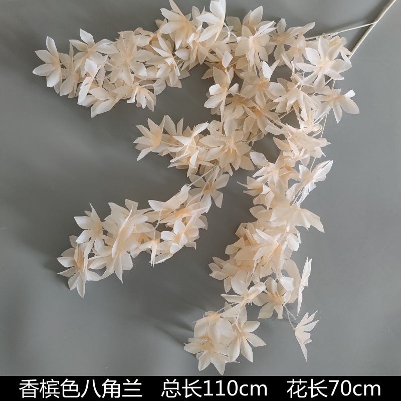 シャンパン色の結婚式の花の花の花の材料の結婚祝いの装飾の花の講堂の装飾の花のプラスチックの花の道は花の造花を導いています。|undefined