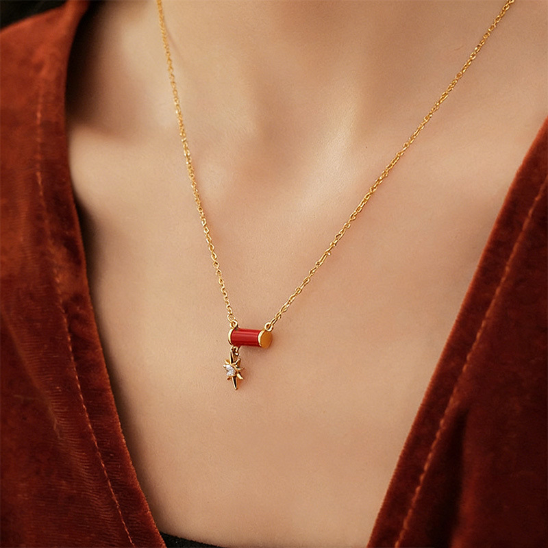 Moda europea y americana de alta calidad goteo de aceite rojo conejo estrellas fuegos artificiales buenas cosas colgante de maní collar pendientes de Año Nuevo