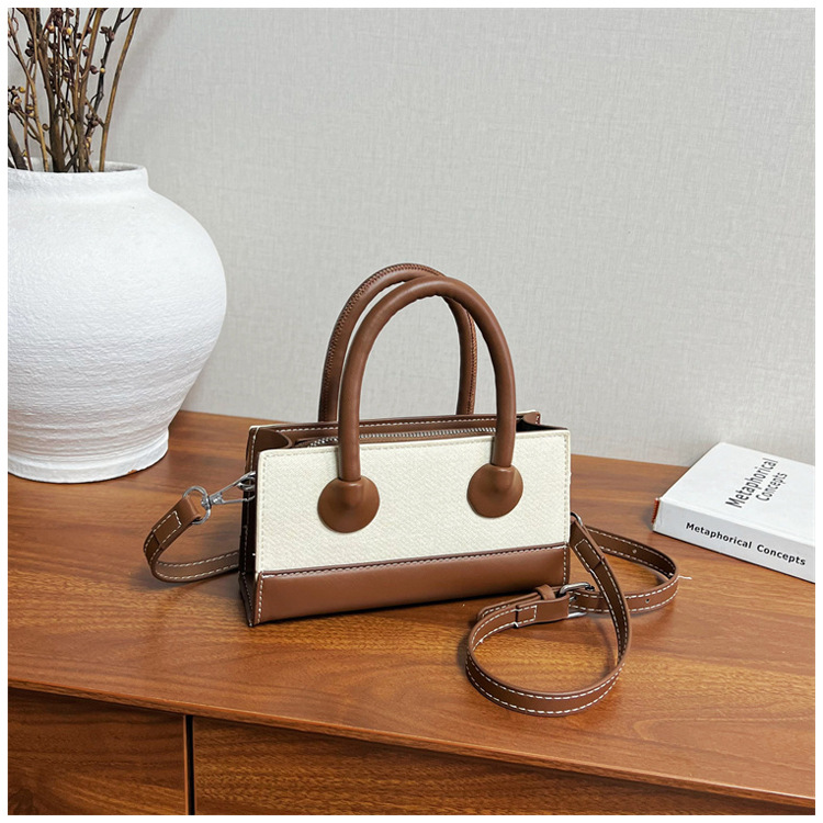 Bolso de mano de alta sensación para mujeres 2026 nuevo color de moda bolso de empalme pequeño bolso de hombro de lujo pequeño bolso image 14