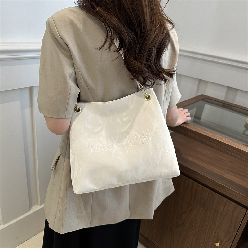 Bolsa plegable de gran capacidad para mujeres 2024 nuevo bolso de verano popular bolsa de viaje de hombro