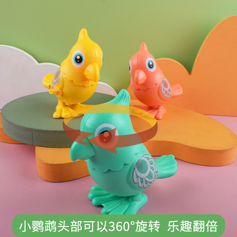 Winding loro lindo pájaro reloj de juguete para niños sinuoso salto puesto Venta caliente Parque atracciones regalos al por mayor