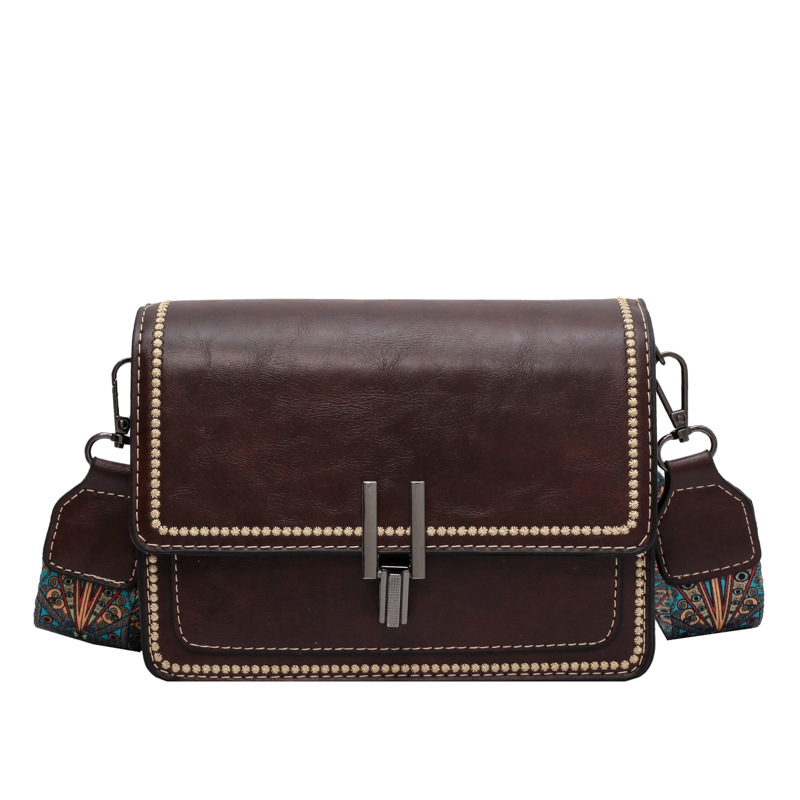 Popular retro textura bolso cuadrado para mujeres 2025 nuevo estilo simple de moda bolso de hombro correa ancha mochila casual