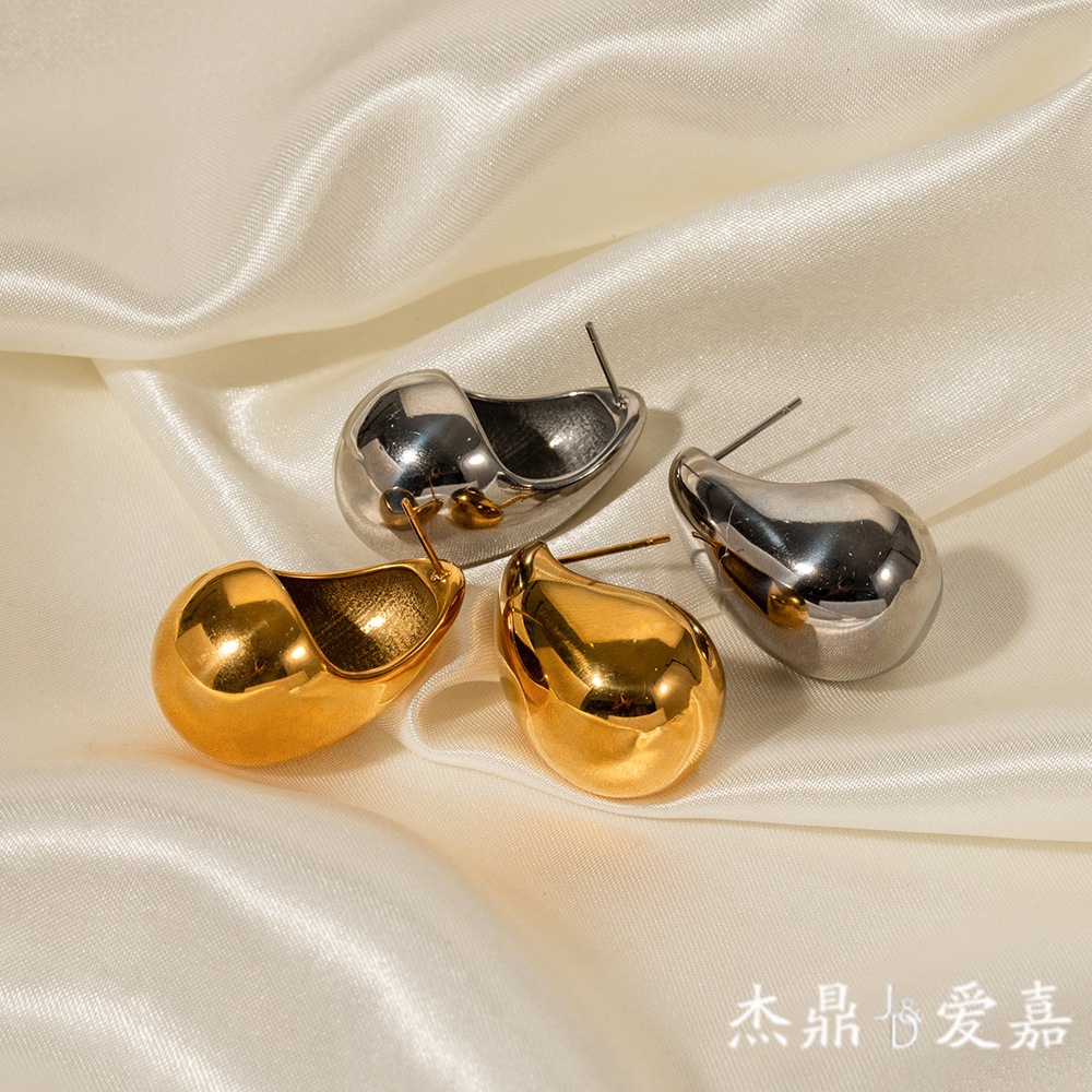 Diseño de alta gama sentido 18K oro gordito gota de agua pendientes de acero de titanio INS moda femenina todo partido pendientes geométricos al por mayor