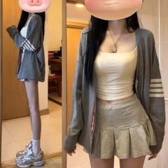 学院の風の襟のニットのカーディガンの外はカーディガンの女性の早秋の怠惰な風の高級感のゆったりした上着を掛けます。