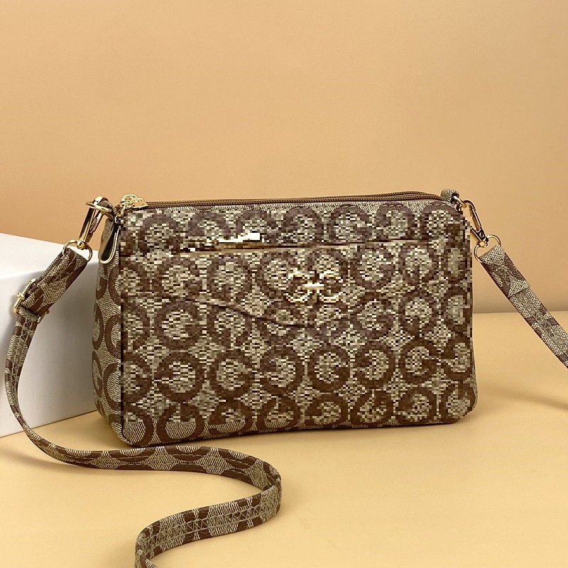 Guangzhou Hengli 2024 nuevo bolso de mensajero transfronterizo bolso casual de mediana edad bolso de teléfono móvil para mujer bolso de venta caliente bolso de hombro