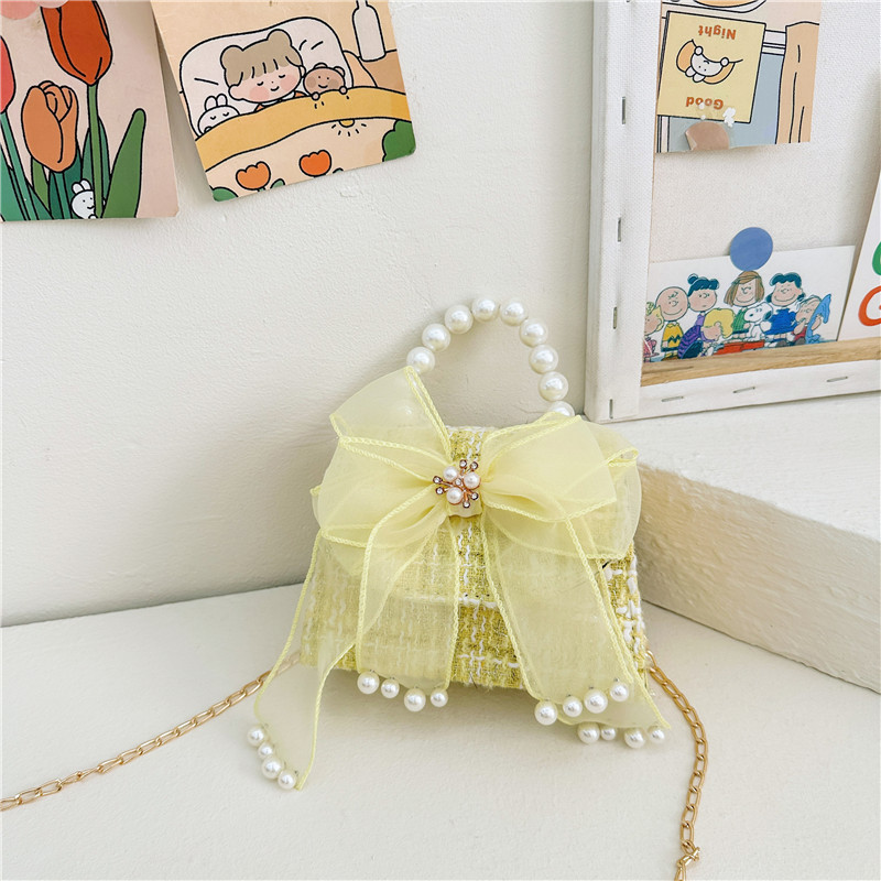 Bolsos de moda de moda para niños, arco de arco, nuevo bolso, cambio de chicas, mochila transfronteriza