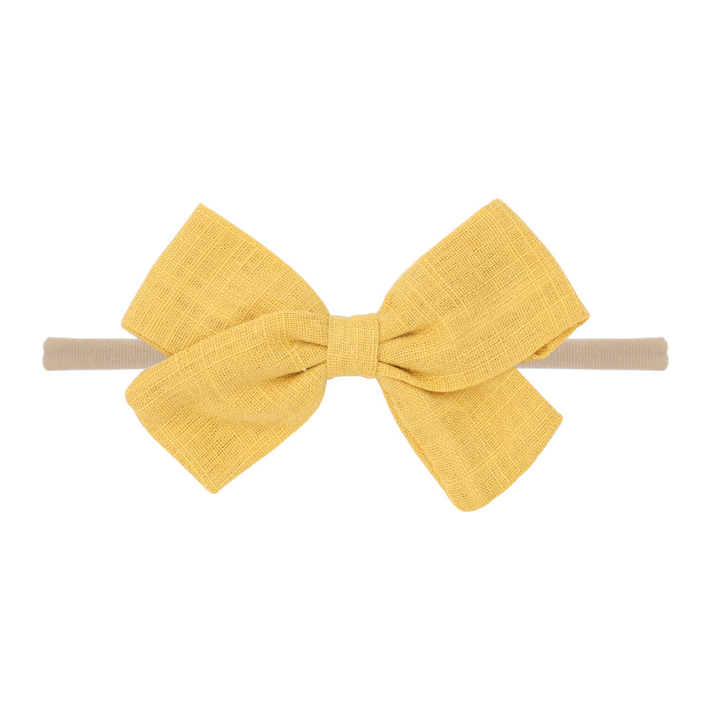 Nihaojewelry Cute Children's Cotton And Linen Fabric Bow Hair Band Wholesale Jewelry display picture 7