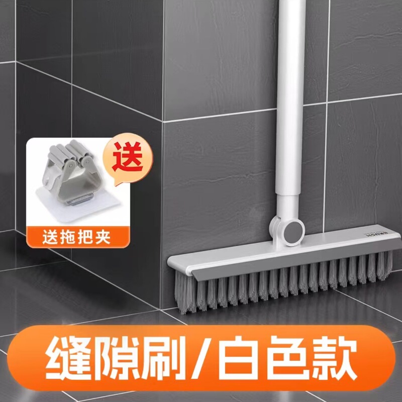 床ブラシトイレの長い柄の床ブラシの隙間の浴室の壁をきれいにして浴室のタイルを洗います。|undefined