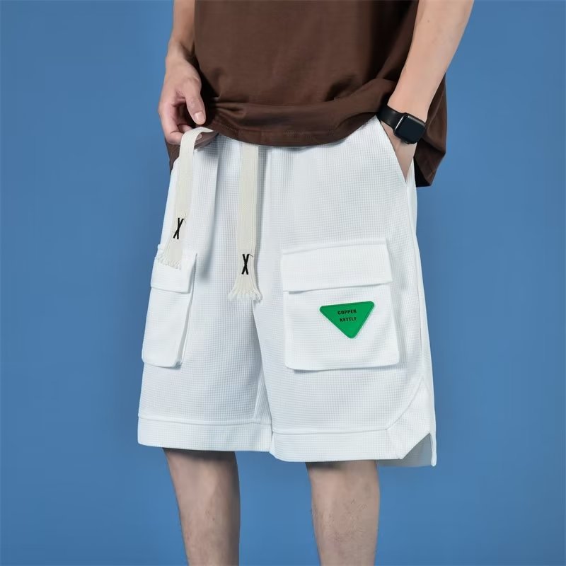 Pantalones cortos de herramientas casuales para hombres, ropa exterior de verano, pantalones de cinco puntos bf sueltos de la marca de moda, pantalones rectos de todo fósforo para adolescentes de estilo de Hong Kong