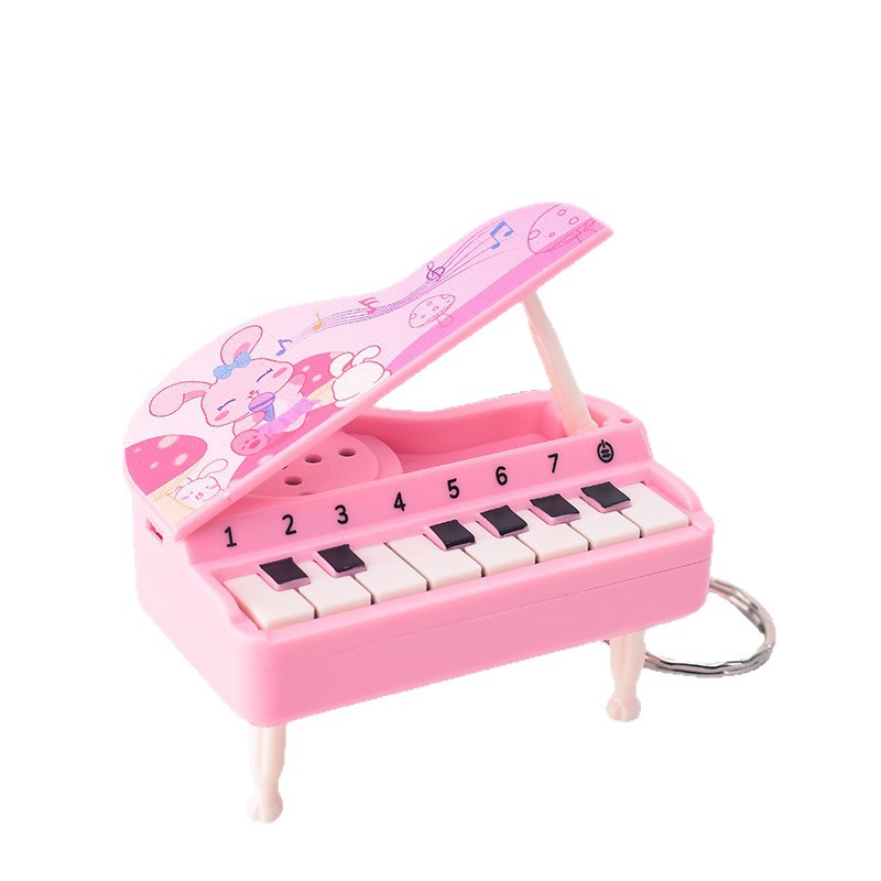 Transfronterizo portátil mini plegable piano de escritorio llavero colgante de simulación de teclas luminosas regalos musicales creativos