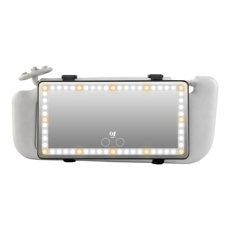 Un lote de espejo de maquillaje de coche led con luz recargable ins luz de relleno visera de coche espejo de belleza luminoso
