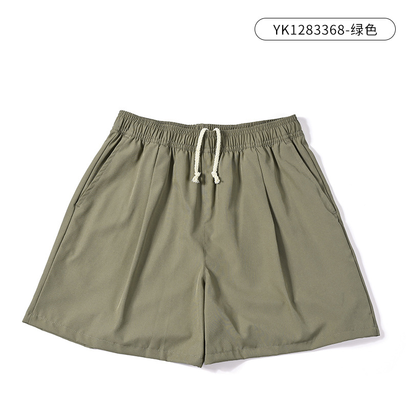 Pantalones cortos deportivos de secado rápido para mujer estilo delgado de verano 2025 nuevos pantalones de playa de pierna ancha sueltos simples y casuales