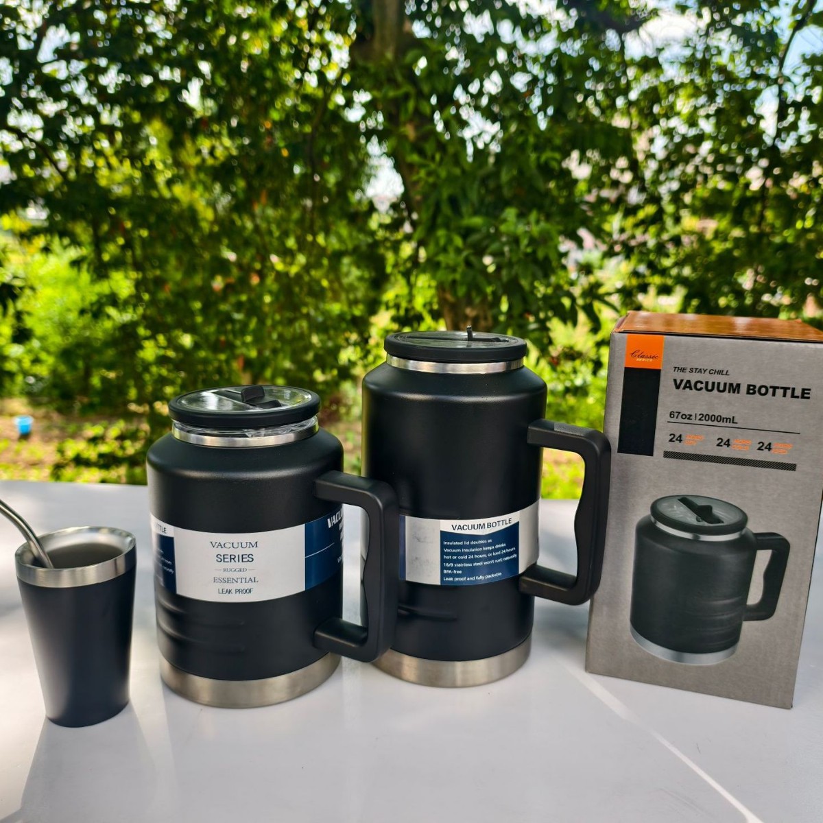Nuevo estilo de gran capacidad con mango Toneladas Toneladas Toneladas Botellas deportivas de montañismo al aire libre Taza de vacío de acero inoxidable Taza de vacío