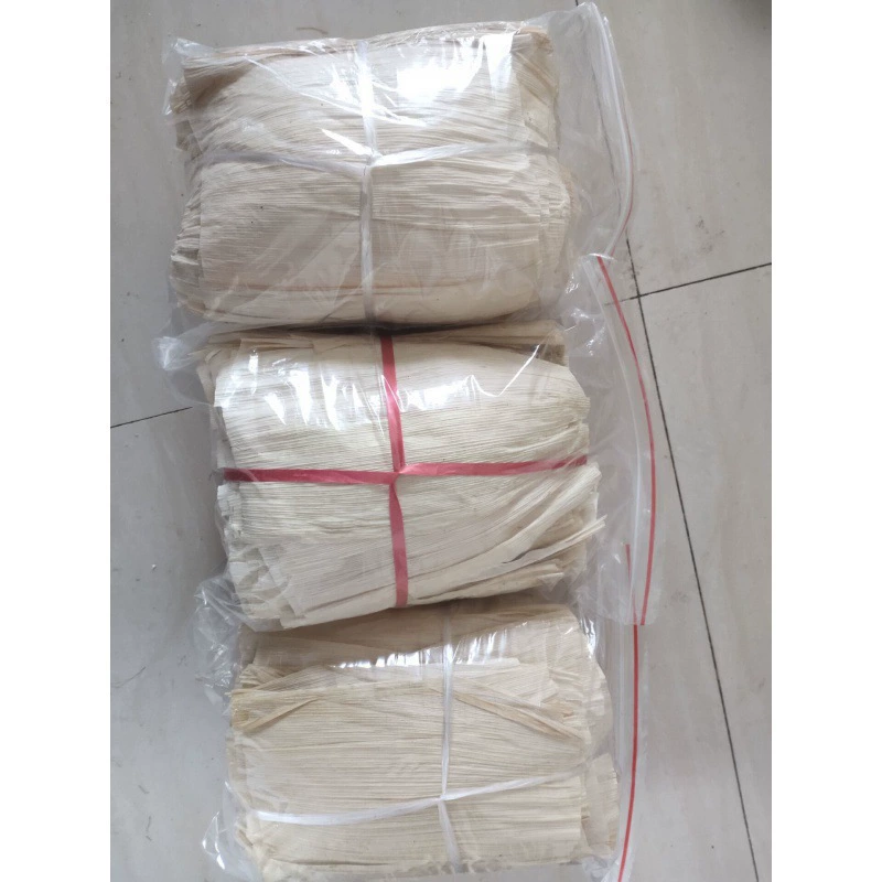 Новогодние новые кукурузные листья, кукурузные листья, кукурузные листья, натуральная клеточная ткань, замороженные рисовые лепешки, рисовые лепешки, кукурузные листья.