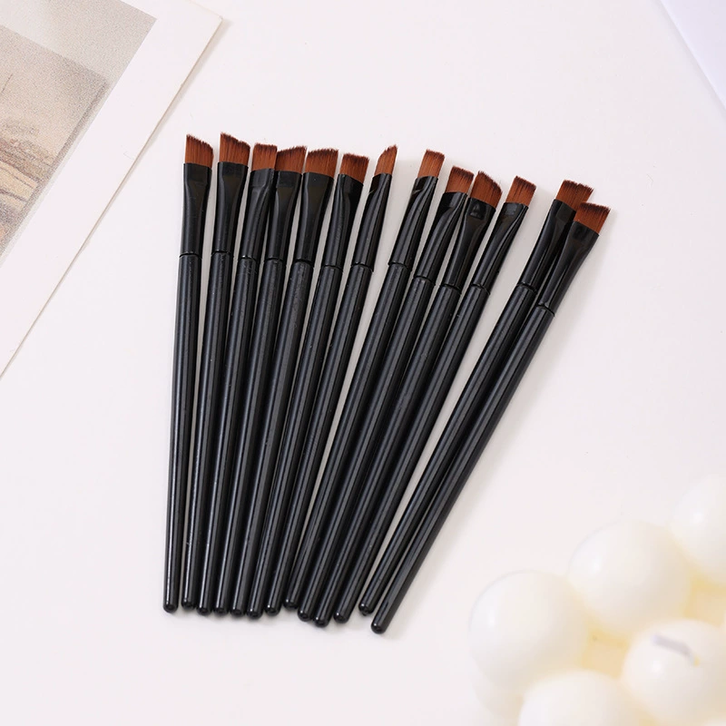 Makeup Brush handheld black, plastic handle, angled small brush for primer and eyeliner