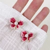 Fuchsia mosquito coil, ear clips, flowered
