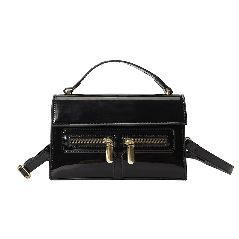 Bolso de diseño de nicho 2025 verano nuevo bolso femenino de alta calidad textura bolso de hombro charol brillante bolso de mensajero marea