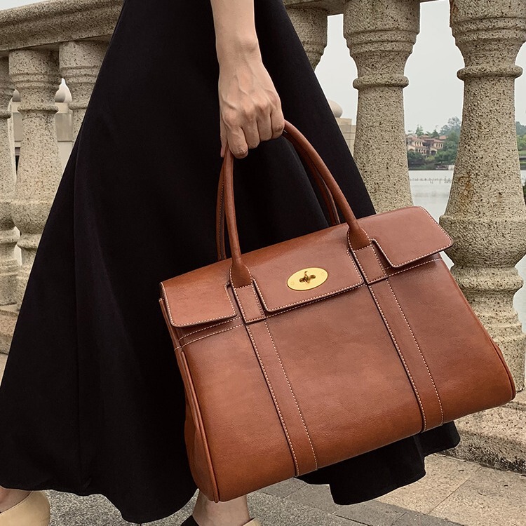 Vegetable Tanned Leather Handbag 2024 New Commuter Retro Tote Bag Women's Bag Simple Briefcase Large Capacity Shoulder Bag Vegetable Tanned Leather Handbag 2024 New Commuter Retro Tote Bag Women's Bag Simple Briefcase Large Capacity Shoulder Bag