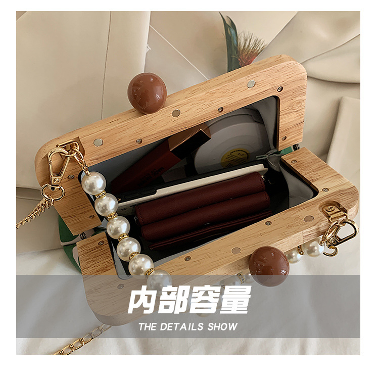 Fashion Contrast Color Chain Wooden Handle Pearl Handbag display picture 16