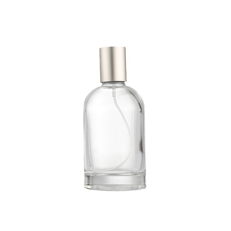 Envase de perfume vacío, botella de spray de alta gama, botella de perfume recargable de vidrio transparente de 30 ml, sensación de alta gama, listo para venta al por mayor.