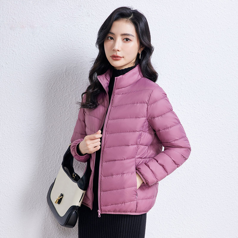 90 chaqueta de plumón de mujer con capuchón ligero corto de tamaño grande ligero estilo extranjero chaqueta de plumón blanco chaqueta Pinghu al por mayor