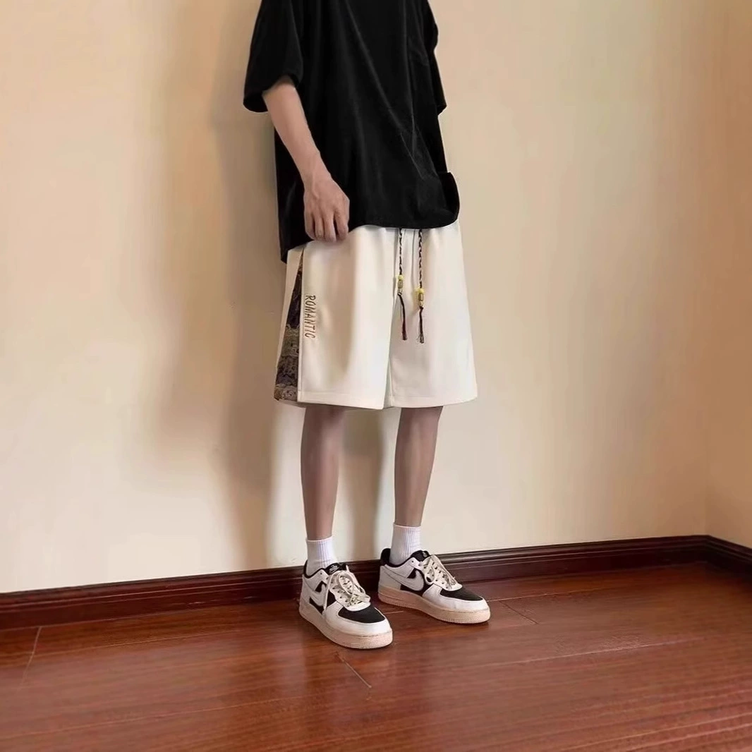 2025 Внешняя торговля Летние тонкие шорты Мужское платье с принтом буквенно-укороченные брюки Быстрый высыхший спорт Потение прохладные брюки