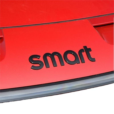 Car logo: 3 Black Hood Emblem, Letter