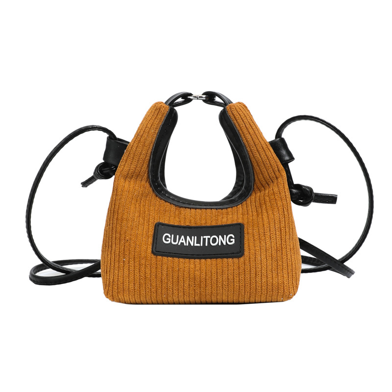 Bolso de niña de color sólido coreano lindo mini mochila de bebé otoño invierno nuevo bolso de hombro para niños de lana