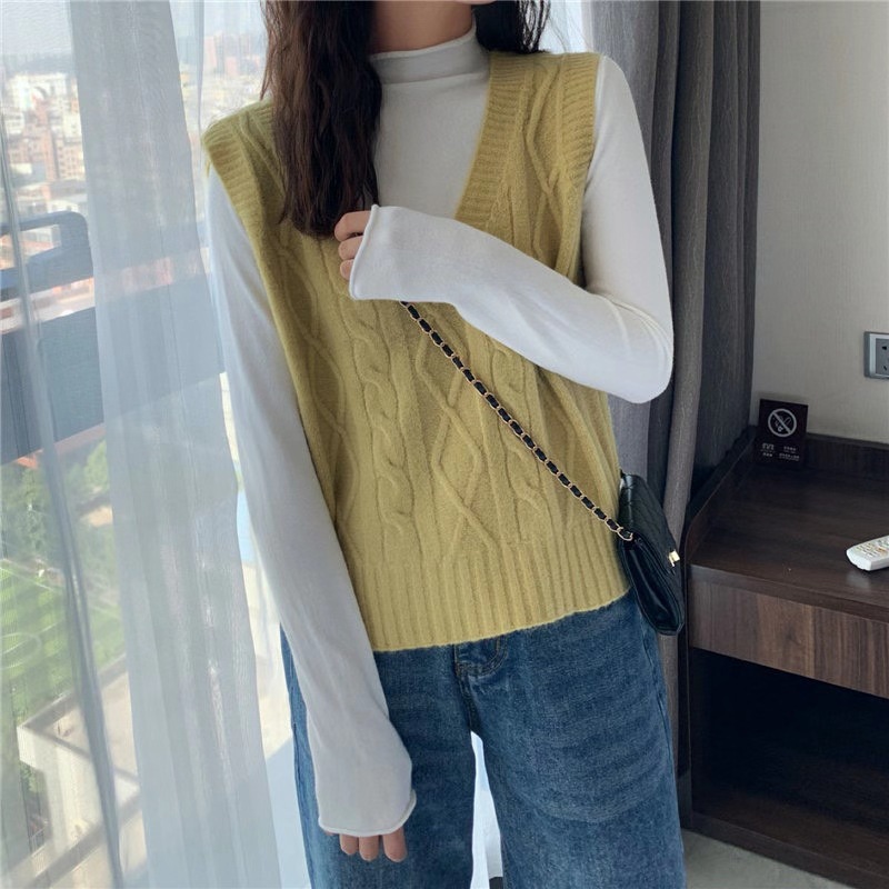 Personalizada primavera y otoño coreana gruesa camiseta de punto de cuello en V chaleco de torsión de mujer con hombros sueltos sin mangas