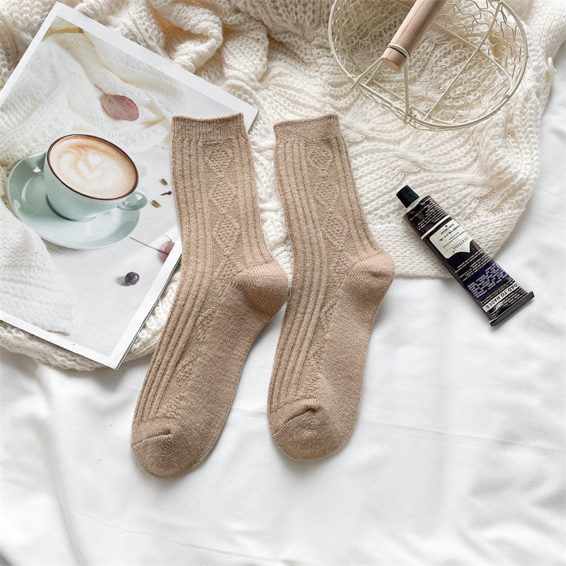 ウールの靴下の子供の秋冬の保温は厚いです。