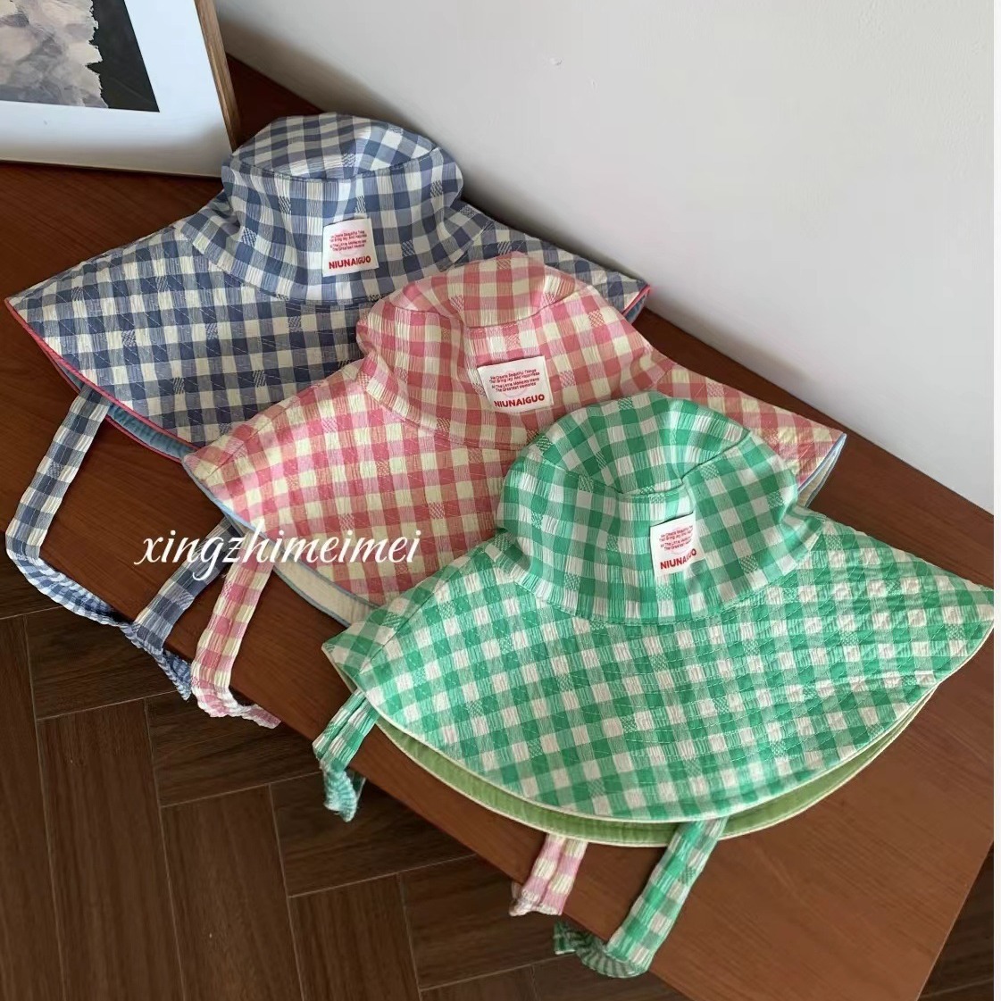 Nuevo estilo coreano ins cuadrícula correa sombrero de pescador mujer verano viaje al aire libre gorra de doble cara gran sombrero de protección solar