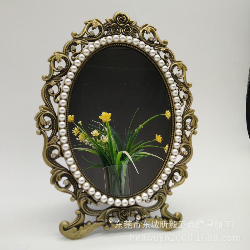 Bronze metal frame mirror with pearls and diamonds, Princess Mirror. Simple and stylish Bronze metal frame mirror with pearls and diamonds, Princess Mirror. Simple and stylish