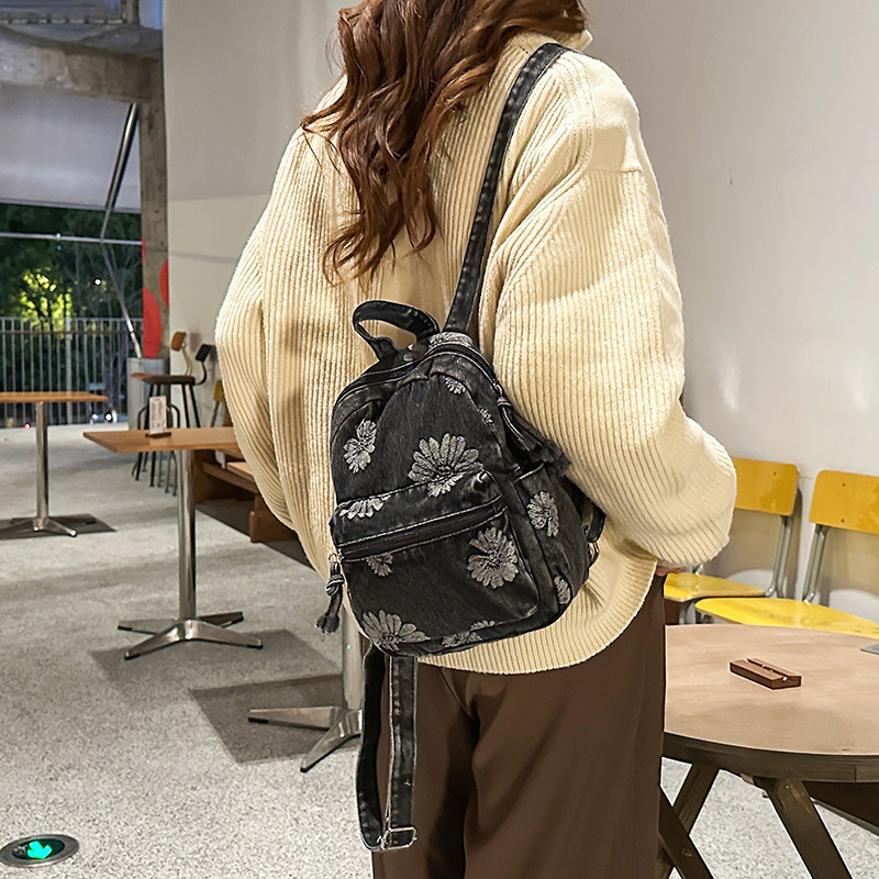 Mochila de denim japonesa retro 2026 nueva moda de mochila de viaje universal diaria